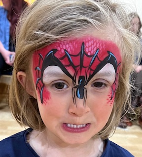 Spiderman face painting on a girl in Shrewsbury